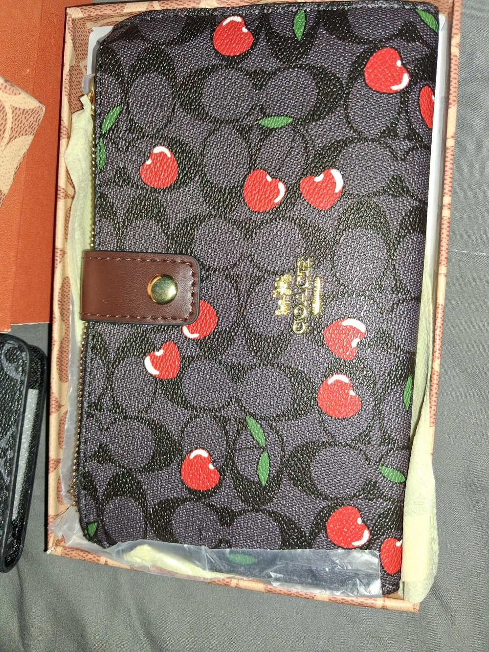 Coach Cherry Wristlet in Brown and Red